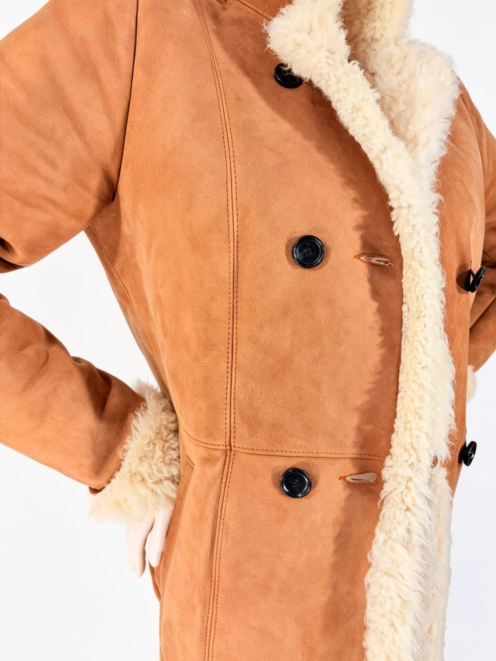 Manteau cuir veritable et l’intérieur 100% laine de mouton